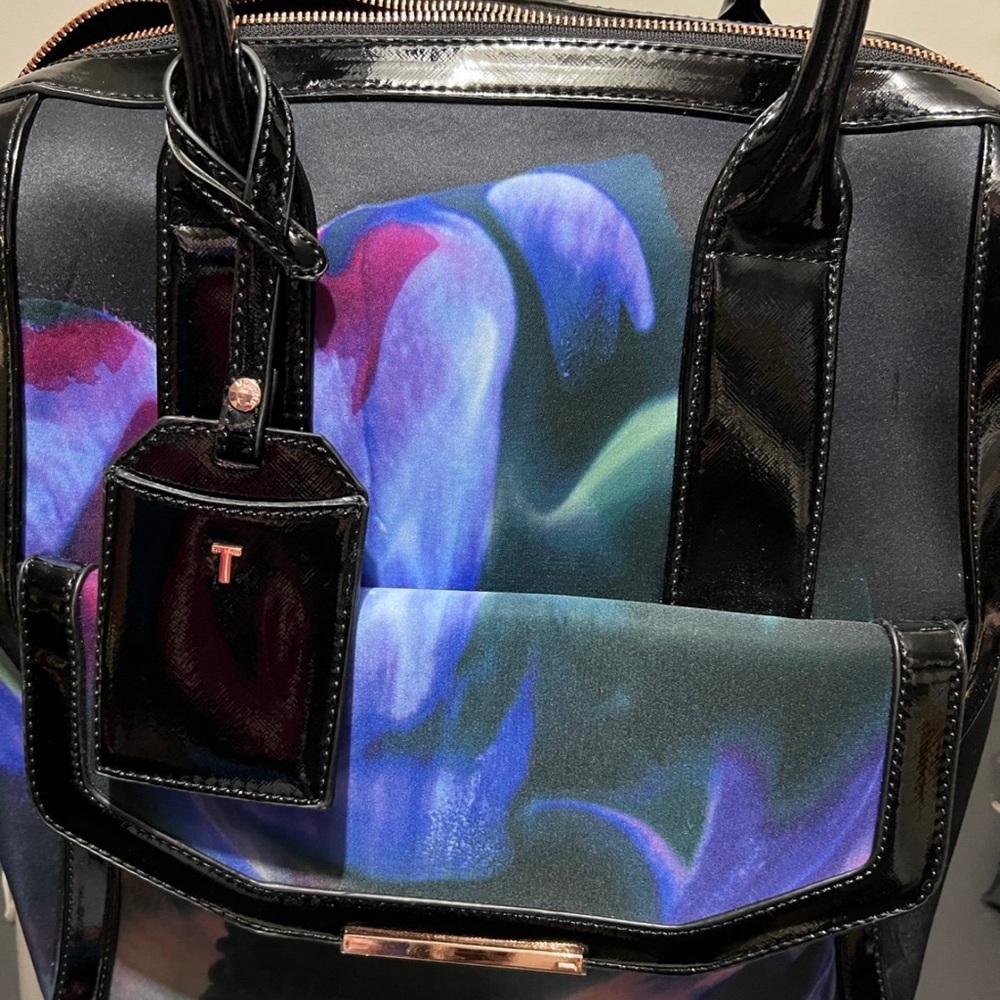 Ted Baker rolling luggage .!